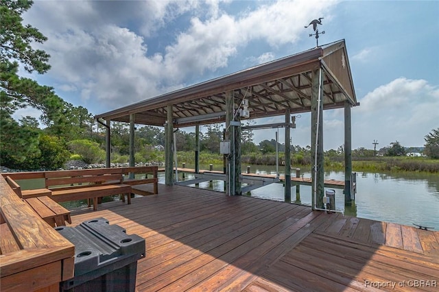 744 Possum Point Rd, Port Haywood, VA 23109 - dock featuring boat lift and a water view