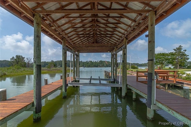 744 Possum Point Rd, Port Haywood, VA 23109 - dock area with boat lift and a water view