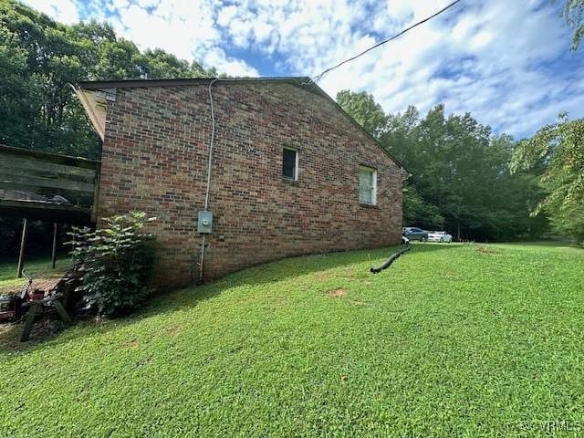 4232 Three Bridge Rd, Powhatan, VA 23139 - view of side of property with brick siding and a yard
