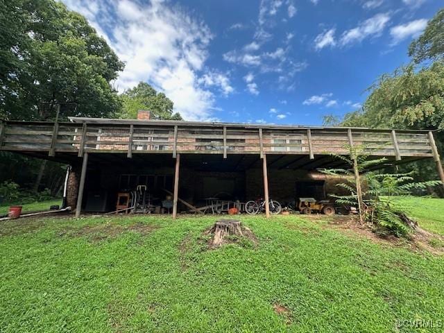 4232 Three Bridge Rd, Powhatan, VA 23139 - rear view of property featuring a deck, a yard, and a chimney