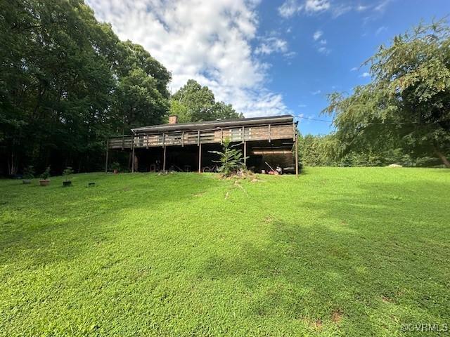 4232 Three Bridge Rd, Powhatan, VA 23139 - rear view of property featuring a lawn