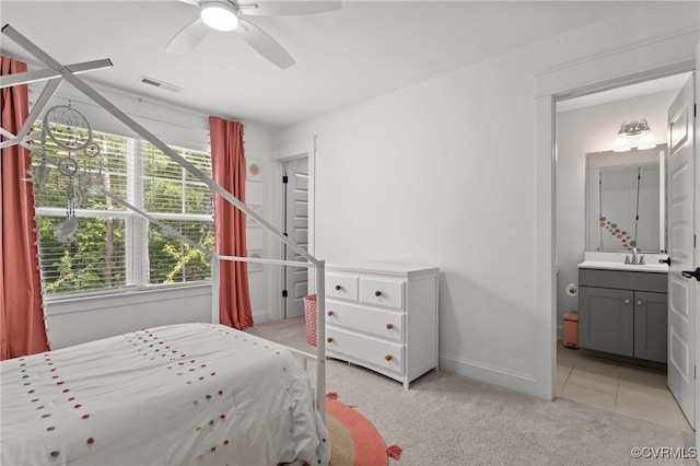9255 Saxsawn Ln, Chesterfield, VA 23832 - bedroom featuring light colored carpet, ensuite bath, and a ceiling fan