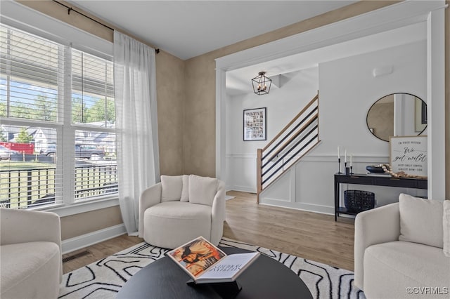 9255 Saxsawn Ln, Chesterfield, VA 23832 - living room featuring wood finished floors, stairway, and a chandelier