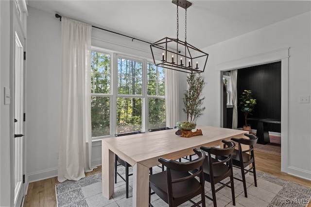 9255 Saxsawn Ln, Chesterfield, VA 23832 - dining area with a chandelier and light wood-type flooring