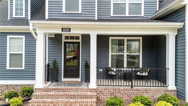 9255 Saxsawn Ln, Chesterfield, VA 23832 - view of exterior entry with a shingled roof and covered porch