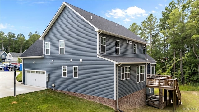 9255 Saxsawn Ln, Chesterfield, VA 23832 - view of property exterior featuring a garage, a wooden deck, a yard, and a shingled roof