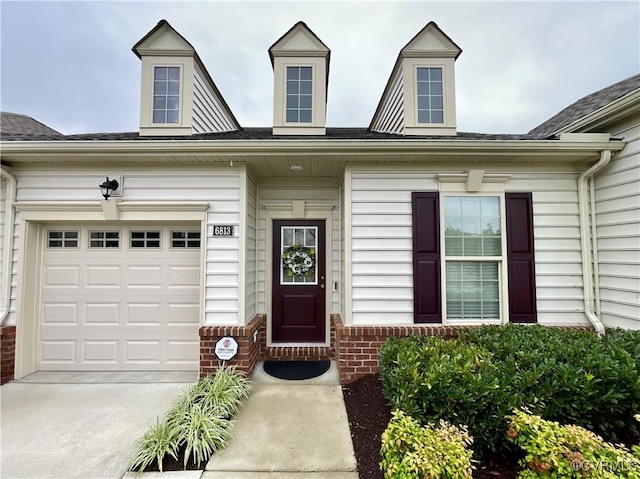 6813 Southwalk Hts, Moseley, VA 23120 - entrance to property with brick siding, a garage, and concrete driveway
