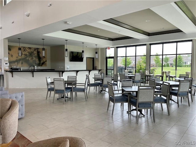 6813 Southwalk Hts, Moseley, VA 23120 - dining area with a tray ceiling and light tile patterned floors