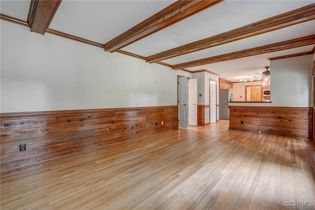 2330 Corner Rock Rd, Midlothian, VA 23113 - unfurnished living room with light wood-style floors, beamed ceiling, a ceiling fan, wainscoting, and ornamental molding