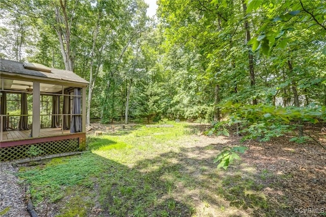 2330 Corner Rock Rd, Midlothian, VA 23113 - view of yard with a sunroom, a wooden deck, and a wooded view