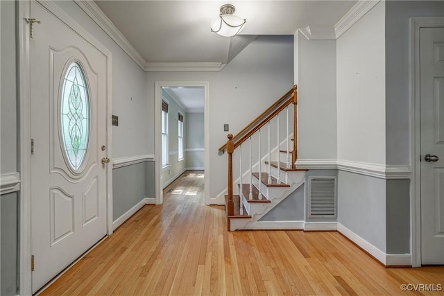 2330 Corner Rock Rd, Midlothian, VA 23113 - entryway with light wood-style floors, ornamental molding, and stairway