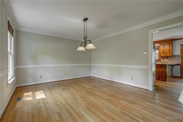 2330 Corner Rock Rd, Midlothian, VA 23113 - spare room featuring light wood finished floors, plenty of natural light, and crown molding
