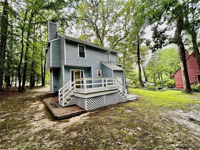 8512 Scottingham Ct, Chesterfield, VA 23236 - rear view of house with a wooden deck and a chimney