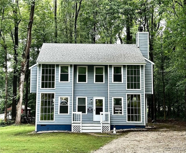 8512 Scottingham Ct, Chesterfield, VA 23236 - back of property featuring a chimney, crawl space, a lawn, and roof with shingles