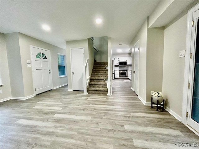 8512 Scottingham Ct, Chesterfield, VA 23236 - foyer with light wood finished floors and stairs
