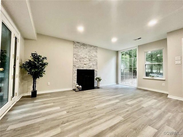8512 Scottingham Ct, Chesterfield, VA 23236 - unfurnished living room featuring wood finished floors and a stone fireplace