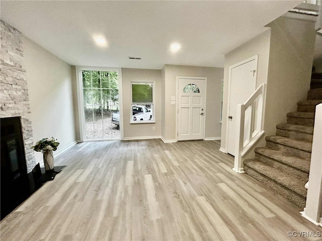 8512 Scottingham Ct, Chesterfield, VA 23236 - entrance foyer with stairway, wood finished floors, and a stone fireplace