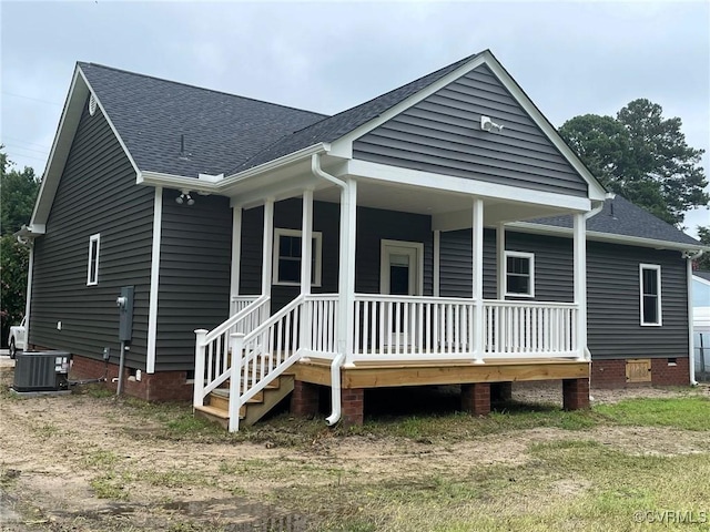 5731 Beechnut Ave, South Chesterfield, VA 23803 - back of property featuring crawl space, a shingled roof, and a porch
