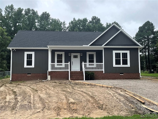 5731 Beechnut Ave, South Chesterfield, VA 23803 - ranch-style home featuring crawl space, a porch, and a shingled roof