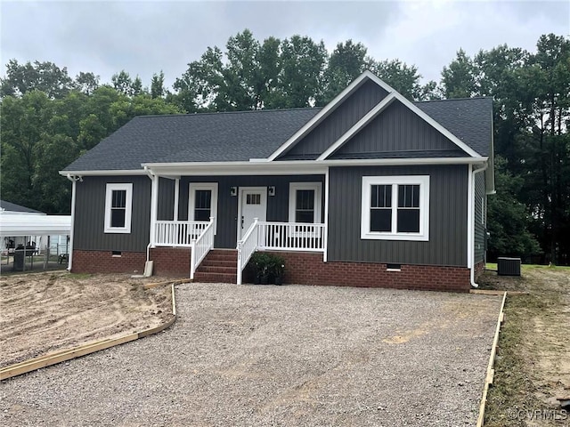 5731 Beechnut Ave, South Chesterfield, VA 23803 - view of front of home featuring crawl space, roof with shingles, and a porch
