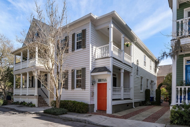 view of front of property with a balcony