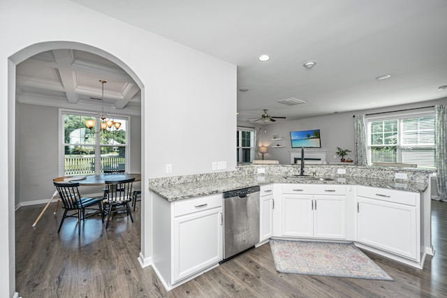 kitchen featuring dishwasher, white cabinetry, kitchen peninsula, and dark hardwood / wood-style flooring