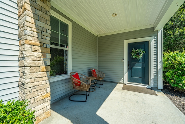 entrance to property with covered porch