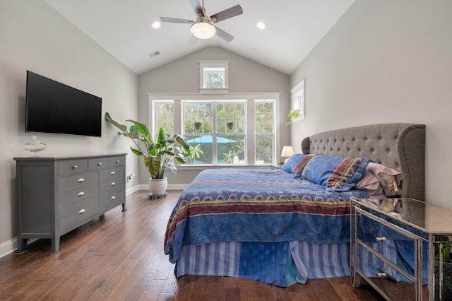 bedroom with dark hardwood / wood-style flooring, lofted ceiling, and ceiling fan