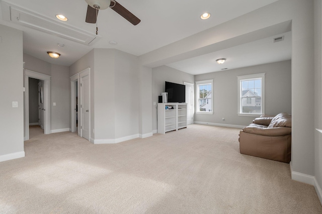 living room featuring light colored carpet and ceiling fan