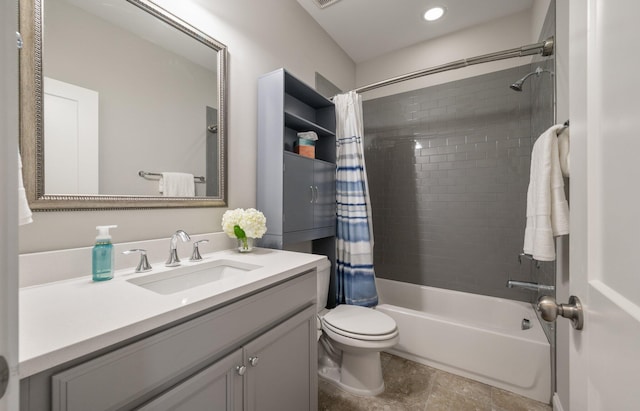 full bathroom featuring vanity, shower / bathtub combination with curtain, and toilet