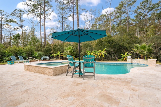 view of pool featuring an in ground hot tub and a patio