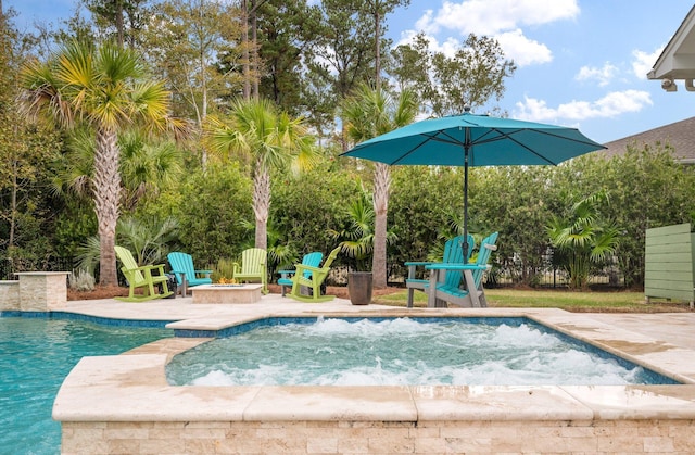 view of swimming pool with a patio