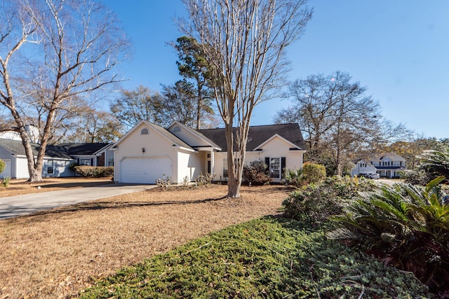 ranch-style home with a garage