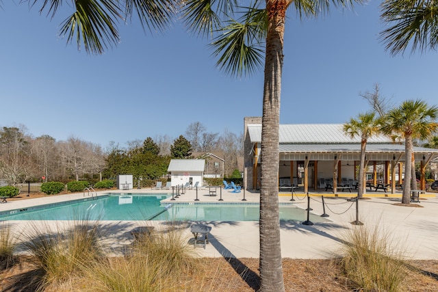 pool with a patio