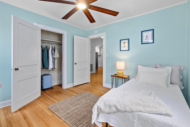 4932 N Rhett Ave, North Charleston, SC 29405 - bedroom featuring light wood finished floors, baseboards, a closet, ornamental molding, and a ceiling fan
