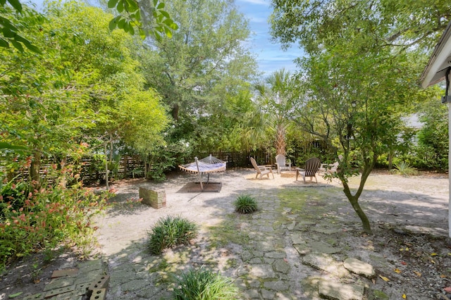4932 N Rhett Ave, North Charleston, SC 29405 - view of yard featuring an outdoor fire pit and a patio area