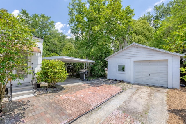 4932 N Rhett Ave, North Charleston, SC 29405 - detached garage featuring concrete driveway