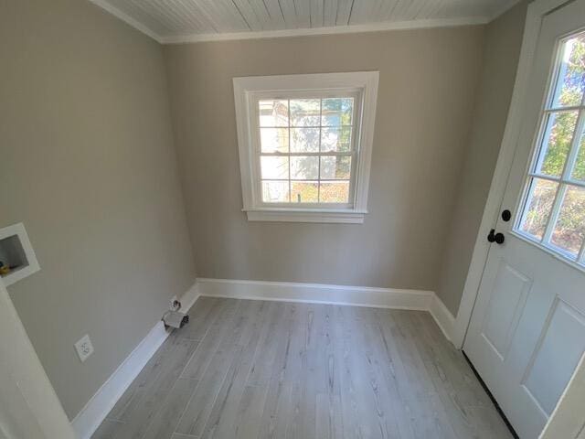 laundry room featuring ornamental molding, washer hookup, and light wood-type flooring