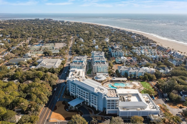 bird's eye view featuring a water view and a view of the beach