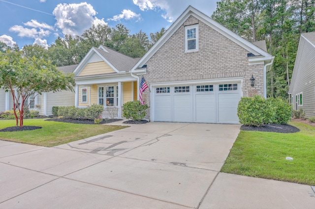 front facade with a front yard and a garage