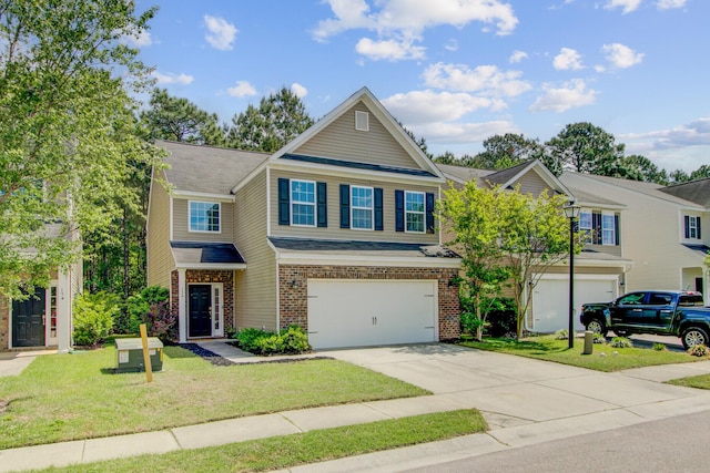 view of front of house featuring brick siding, an attached garage, a front lawn, and concrete driveway