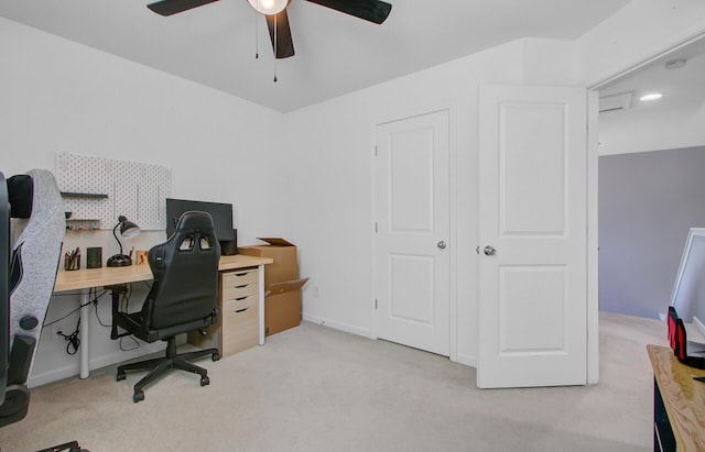 office featuring carpet flooring and a ceiling fan