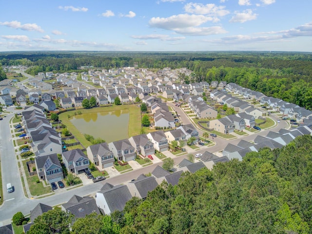 aerial view with a residential view and a view of trees