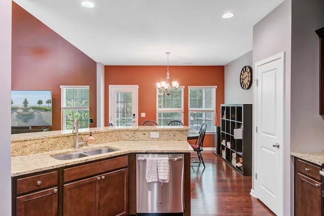 kitchen with a wealth of natural light, dishwasher, a sink, and dark wood-style floors
