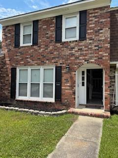 4324 Purdue Dr, North Charleston, SC 29418 - view of front of house with brick siding and a front yard