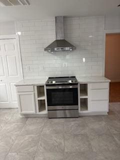 4324 Purdue Dr, North Charleston, SC 29418 - kitchen with stainless steel range with electric stovetop, wall chimney exhaust hood, light countertops, white cabinetry, and open shelves