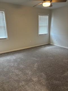 4324 Purdue Dr, North Charleston, SC 29418 - unfurnished room featuring ceiling fan, baseboards, and carpet