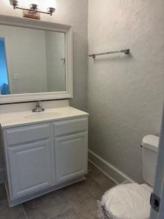 4324 Purdue Dr, North Charleston, SC 29418 - bathroom with toilet, vanity, and tile patterned floors
