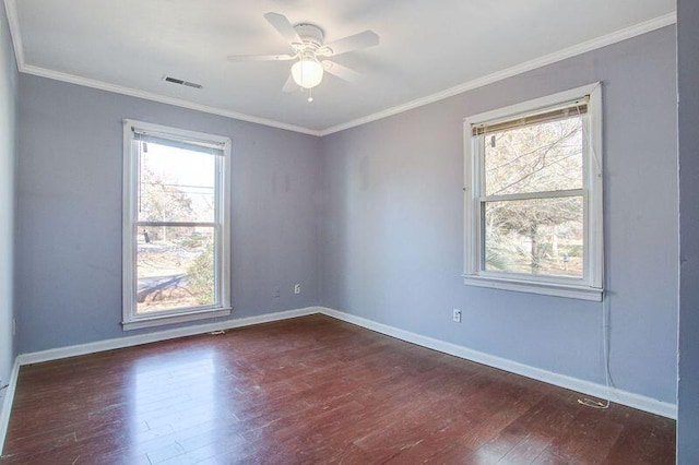 unfurnished room featuring crown molding, dark hardwood / wood-style floors, and ceiling fan