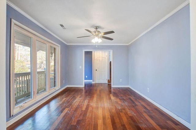 spare room featuring crown molding, ceiling fan, and dark hardwood / wood-style flooring